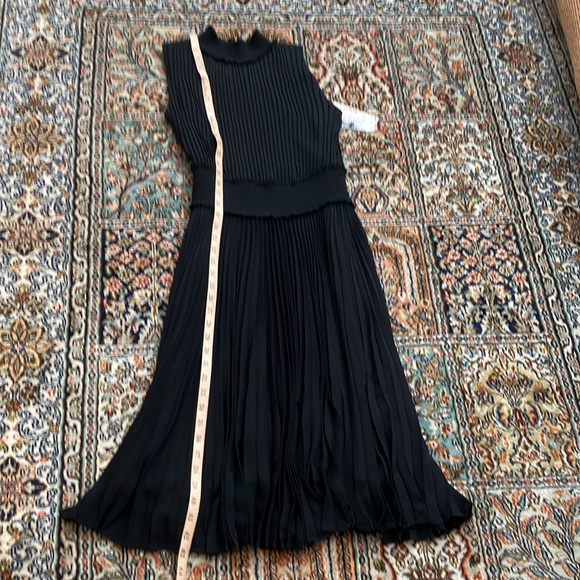 Fabulous LBD blouson dress featuring a smocked waist & accordion pleats - Picture 12 of 15